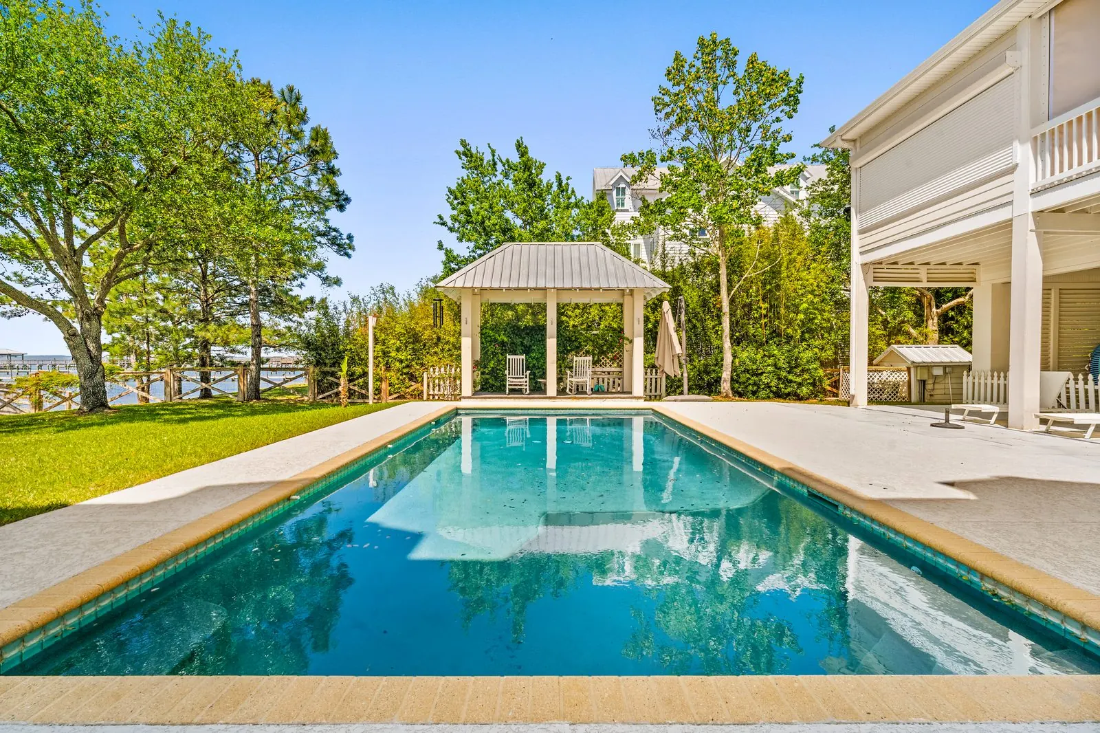 Backyard pool with bay view captured by Jay's Lens