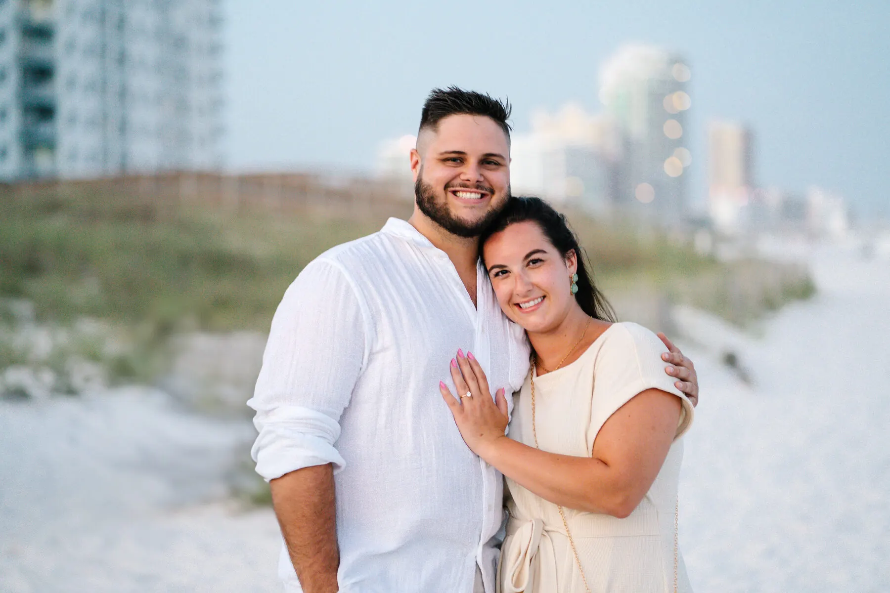 Couple laughing during engagement shoot